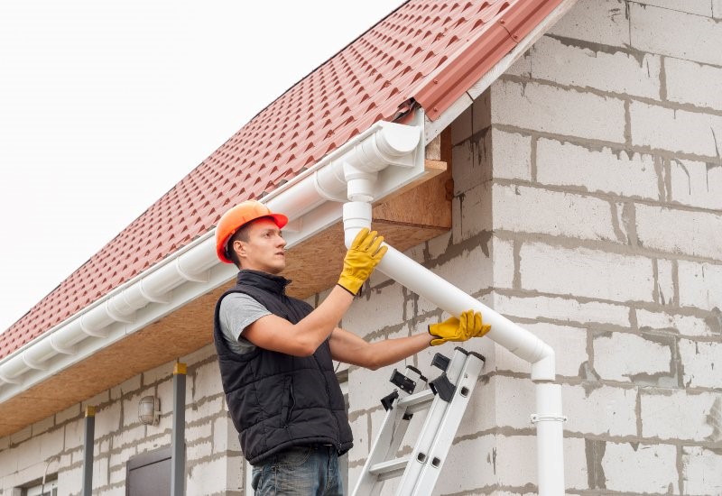 Read more about the article How Far Should Your Downspouts Extend from Your House?