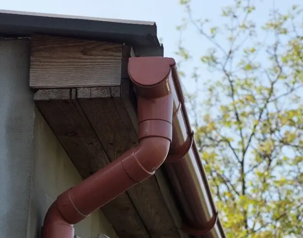 Brown gutter installed on a Seattle, WA home