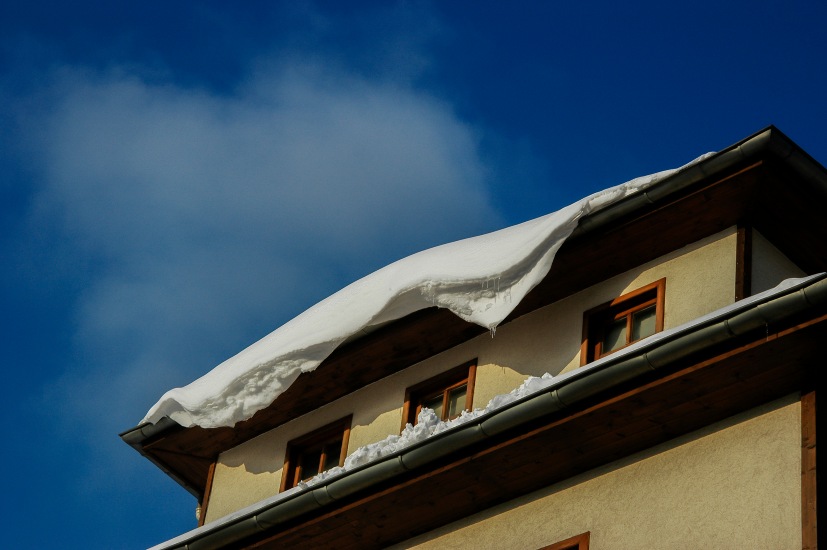 how to protect gutters from snow damage woodinville wa